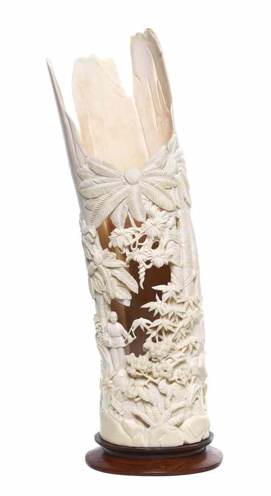 Appraisal: A Chinese Carved Ivory Tusk the hallow tusk carved with