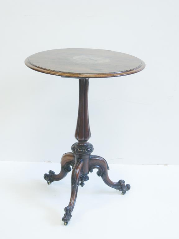 Appraisal: A Victorian rosewood Pillar Table with circular top on fluted