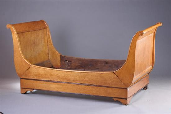 Appraisal: BIEDERMEIER BIRDS-EYE MAPLE SLEIGH BED th century Each paneled side-scrolling