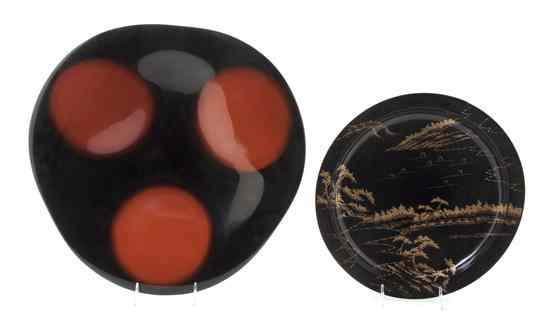 Appraisal: Two Japanese Lacquered Centerpiece Plates one of rounded form with