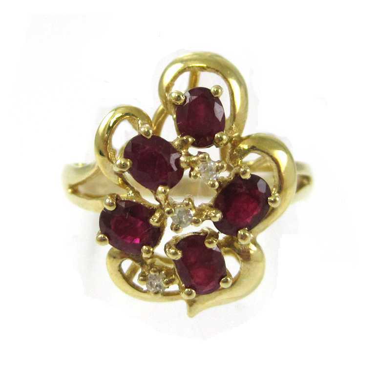 Appraisal: RUBY DIAMOND AND FOURTEEN KARAT GOLD RING set with three