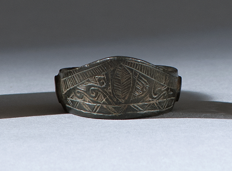 Appraisal: MOGUL ENGRAVED BRONZE THUMB RING th CenturyIn monk's cap form