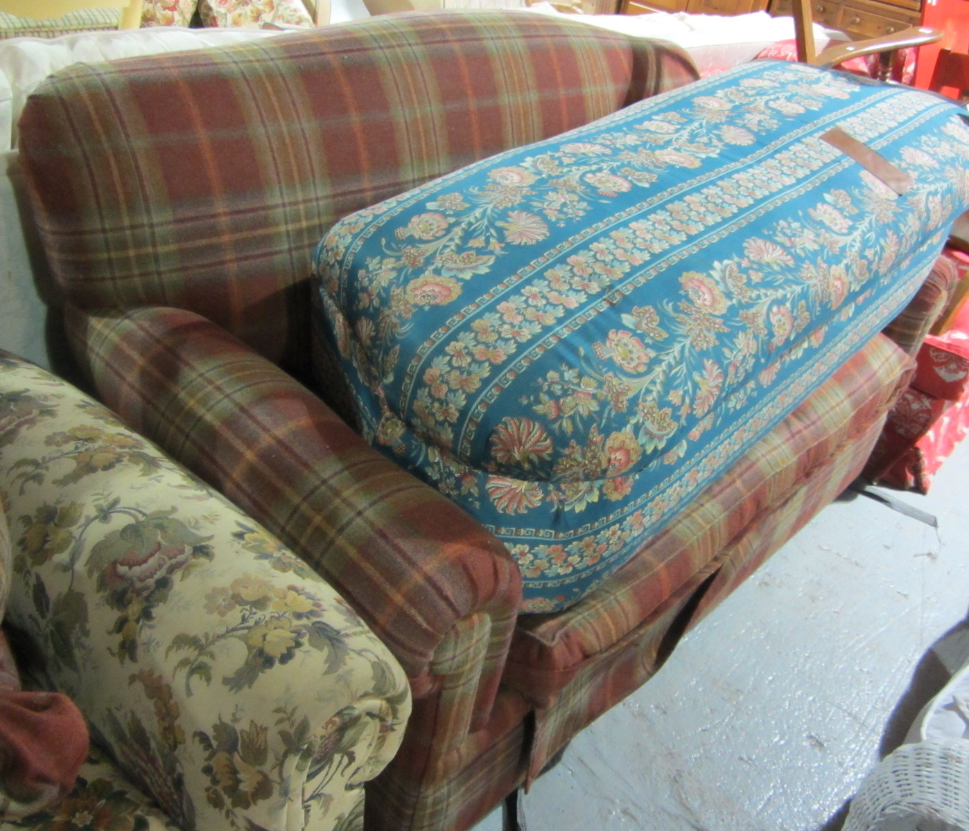 Appraisal: A th century tartan upholstered sofa bed and matching pouffe