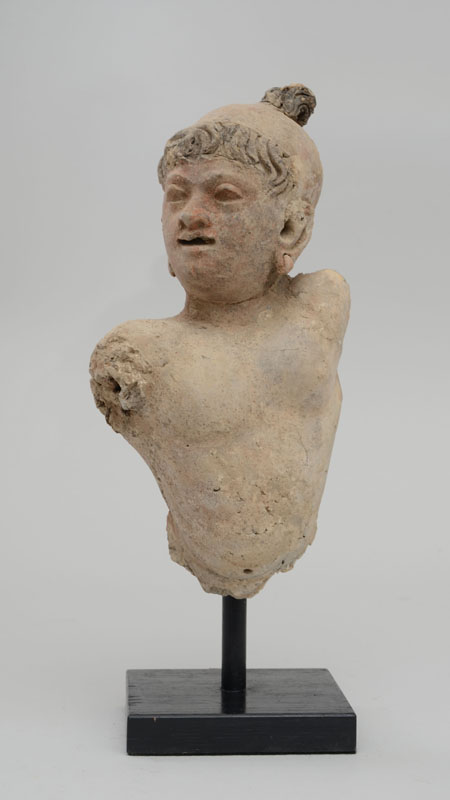 Appraisal: GANDHARAN POLYCHROME BUST OF A YOUTH Possibly th- th century