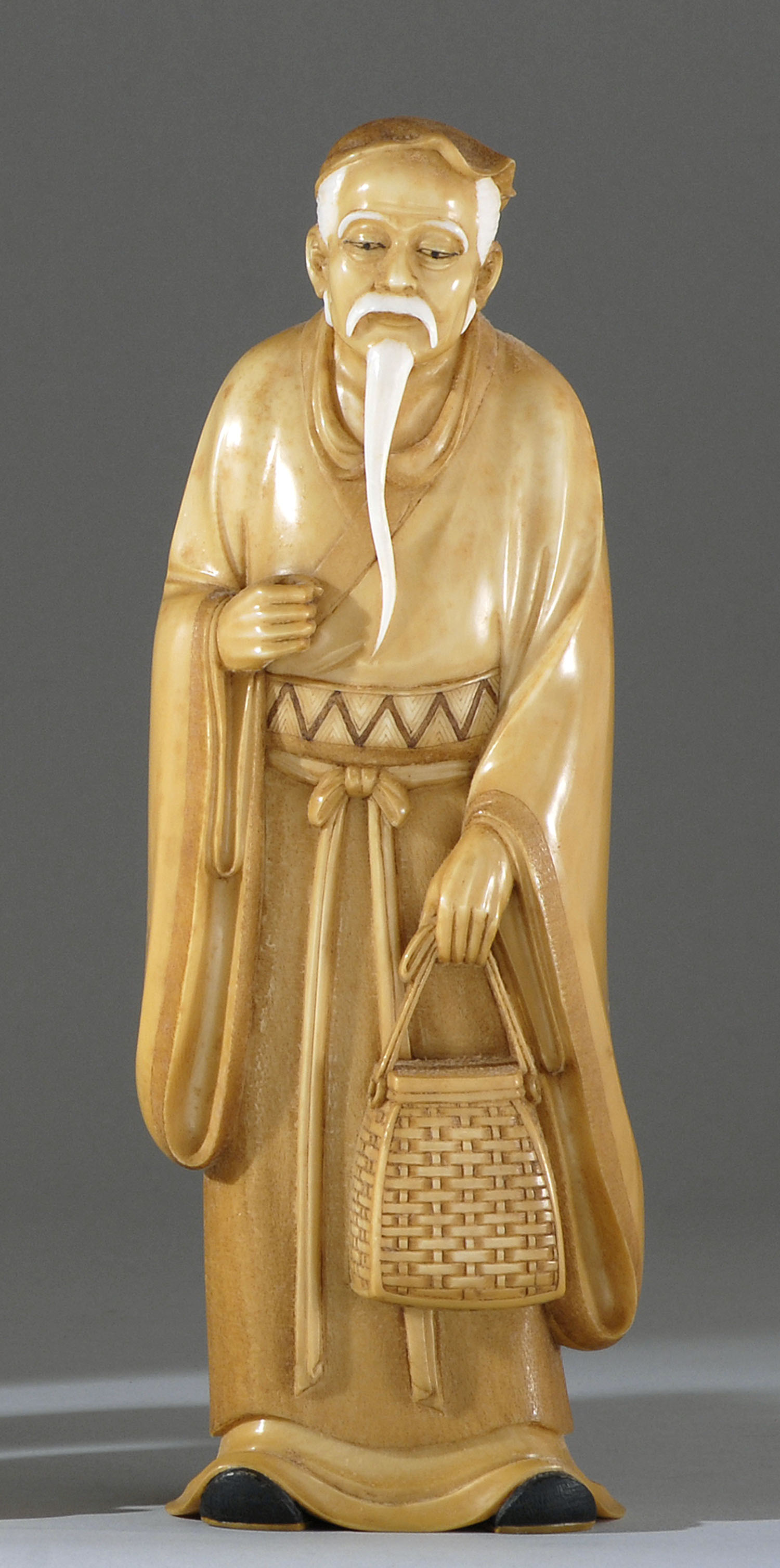 Appraisal: IVORY FIGURE Early th CenturyIn the form of a bearded