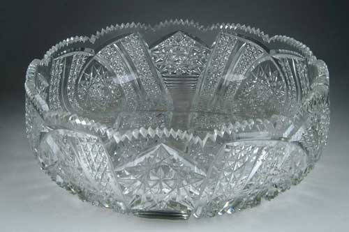 Appraisal: CUT GLASS BOWL Shallow round bowl has Hobstar and other