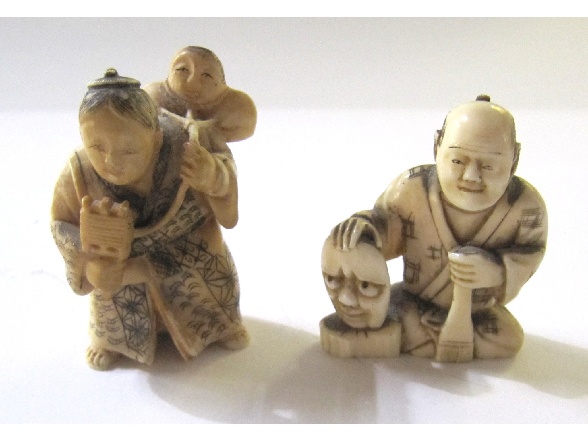 Appraisal: A lot comprising two Japanese netsuke