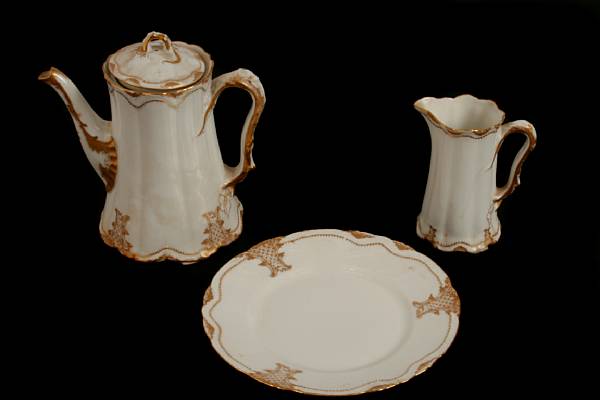 Appraisal: A Limoges porcelain part tea service height of teapot in