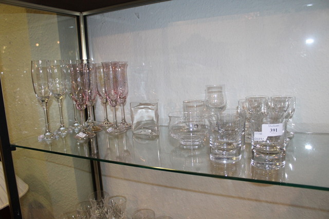 Appraisal: A COLLECTION OF GLASS to include four champagne flutes Dartington