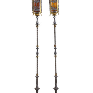 Appraisal: A Pair of Iron and Brass Floor Lamps Circa Height