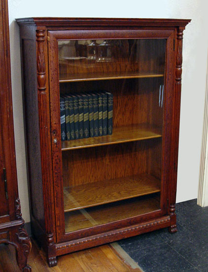 Appraisal: OAK SINGLE DOOR BOOKCASE CA EARLY 'S Oak shelf interior