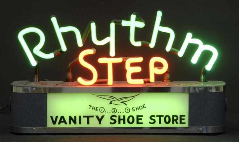 Appraisal: Rhythm Step Shoe Neon Sign Description s Green and red