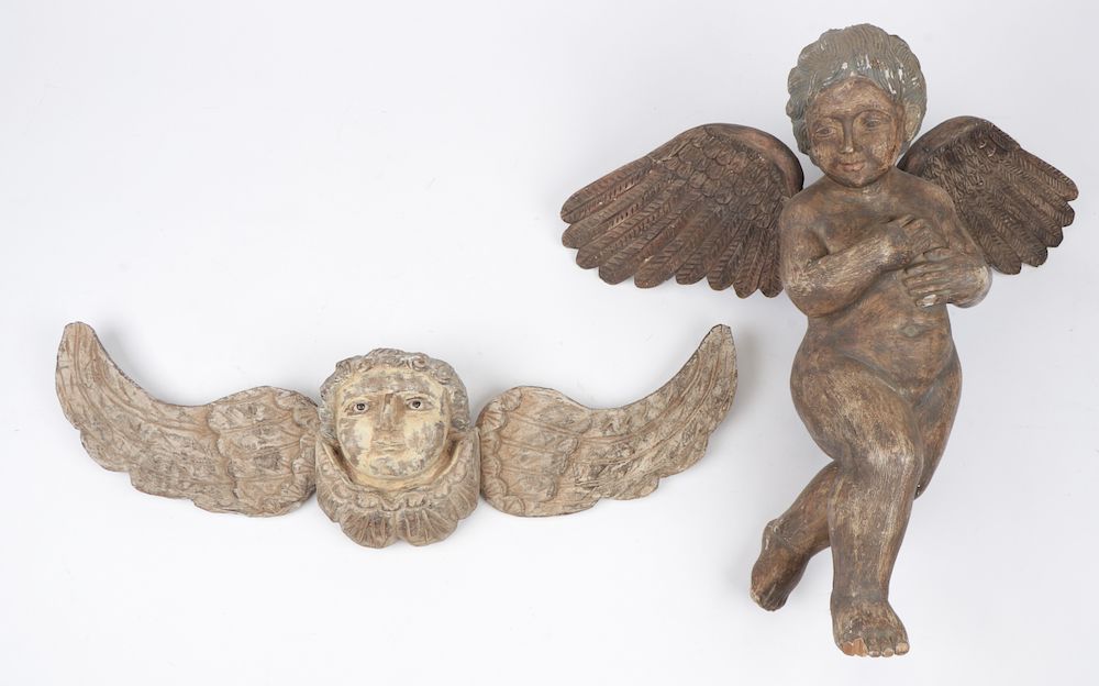 Appraisal: Two Filipino Carved Wood Putti Figures Two Filipino Carved Wood