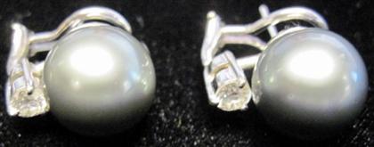 Appraisal: karat white gold black pearl and diamond earrings Single pearl