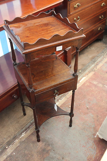 Appraisal: A GEORGE III TWO TIER MAHOGANY WASH STAND the upper