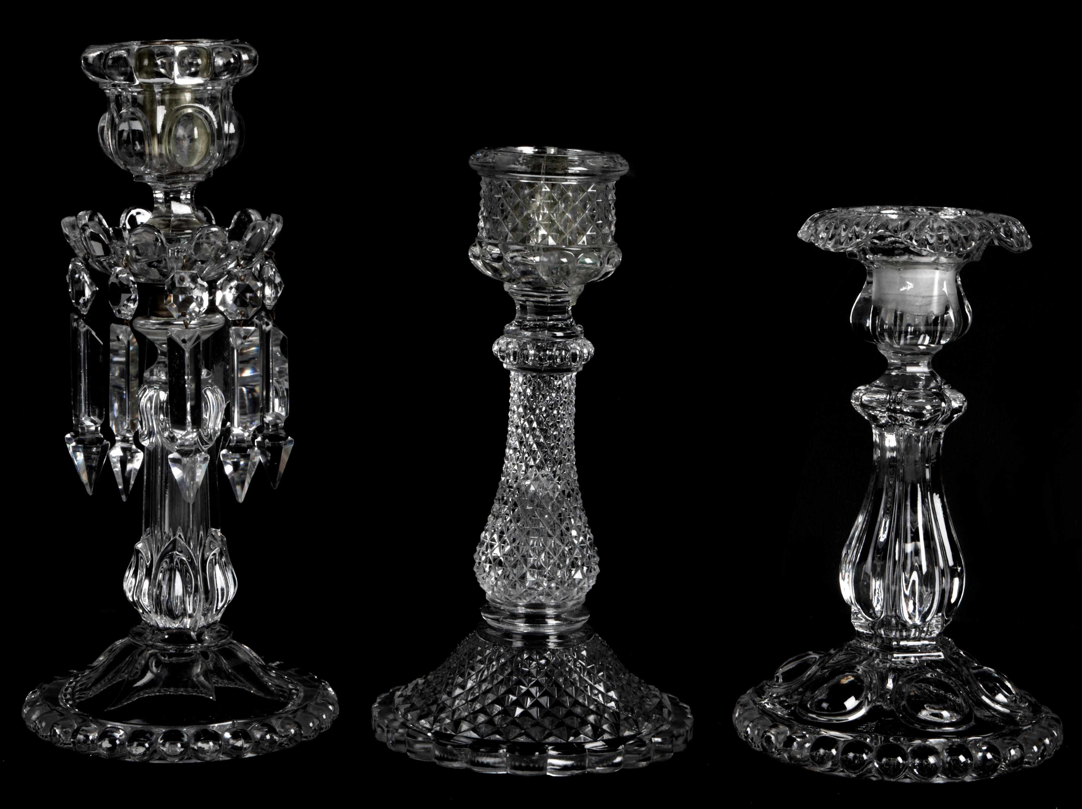 Appraisal: A group of nine assorted Baccarat glass candlesticks height of