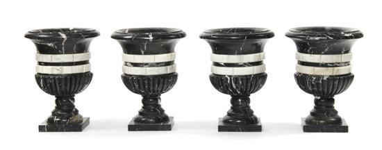 Appraisal: Set of Four Neoclassical Style Marble Urns each black urn