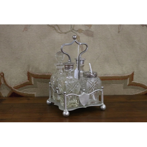 Appraisal: EPNS four bottle cruet stand approx cm H x cm