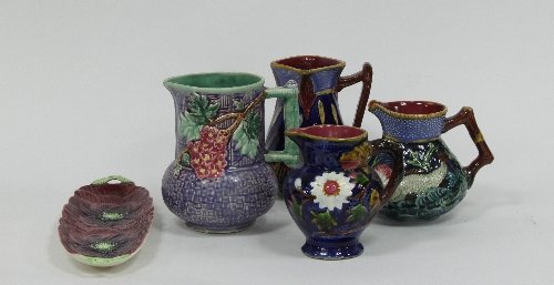 Appraisal: Shorter Son Ltd Four majolica-style ware jugs and an anemone