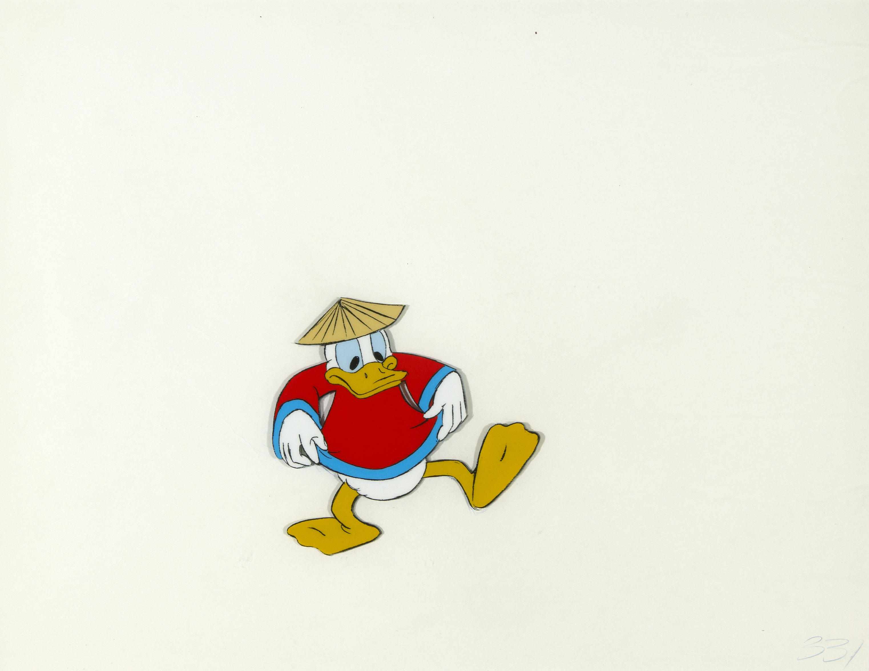 Appraisal: A Walt Disney celluloid of Donald Duck with its matching