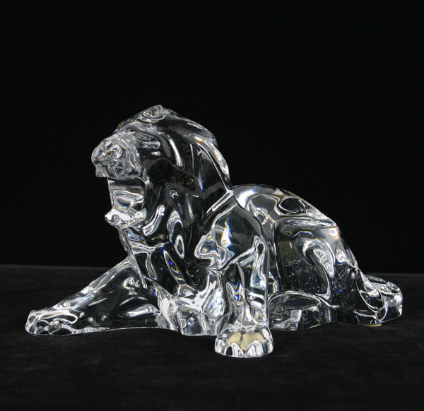 Appraisal: Baccarat lead crystal lion angular sculpture of poised lion L