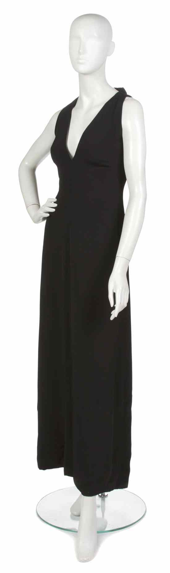 Appraisal: A Mollie Parnis Black Evening Gown plunging neckline bow detail