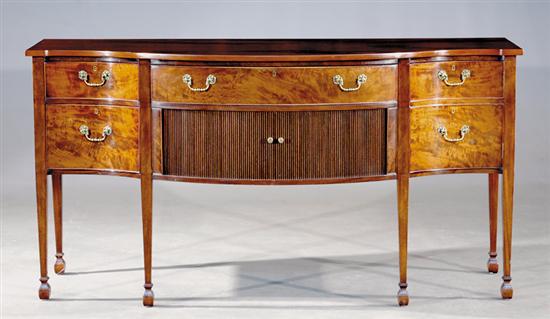 Appraisal: English Sheraton mahogany serpentine sideboard circa shaped top over conforming