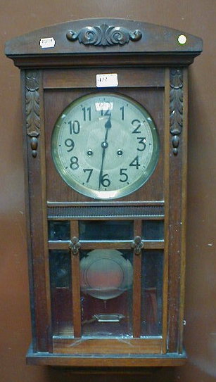 Appraisal: A 's mahogany wall clock