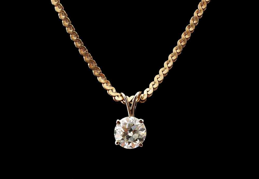 Appraisal: CT DIAMOND PENDANT CHAIN NECKLACE K yellow gold pendant contains