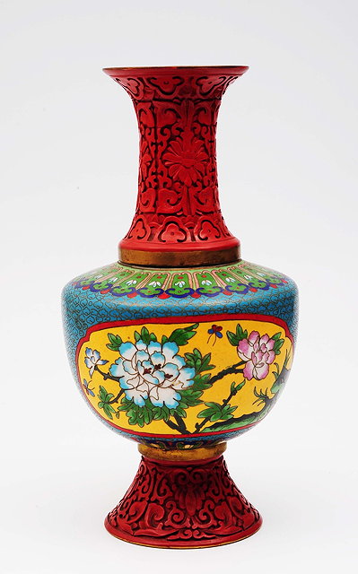 Appraisal: A Chinese cinnabar lacquer and cloisonne baluster vaseearly th Centuryhaving