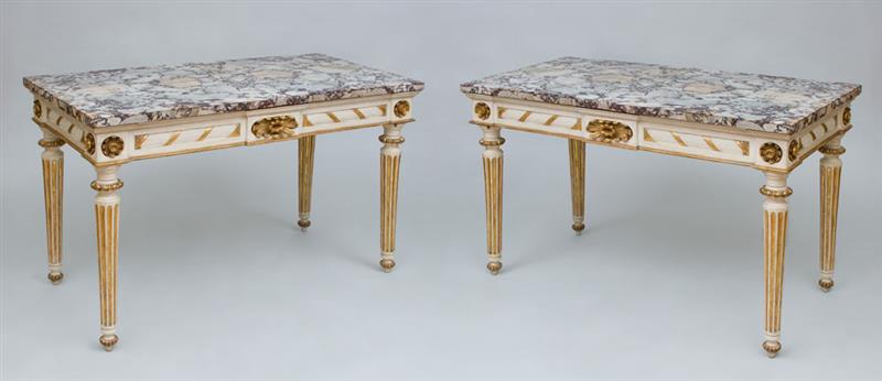 Appraisal: PAIR OF ITALIAN PAINTED AND PARCEL-GILT CONSOLE TABLES x x