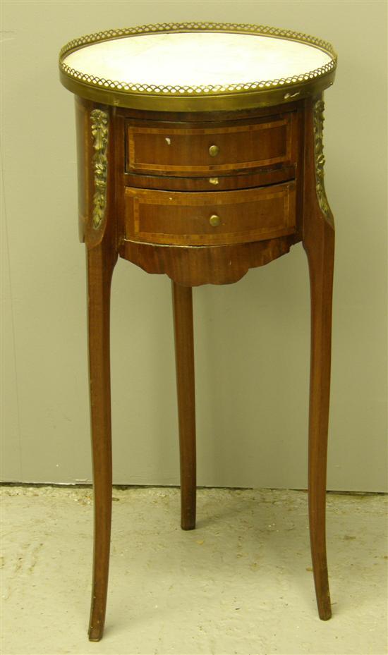 Appraisal: French mahogany circular marble topped occasional table with two cross-banded