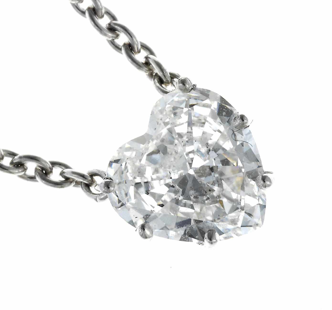 Appraisal: A diamond solitaire necklace the heart-shaped diamond weighing carats mounted