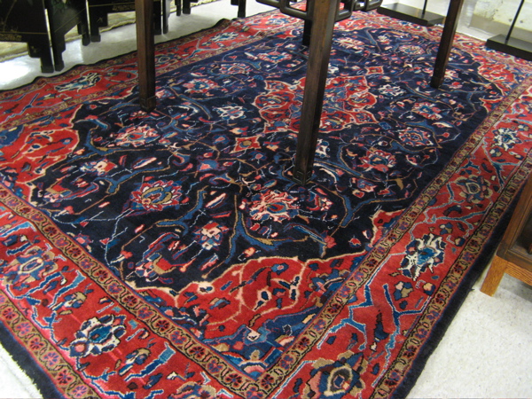 Appraisal: PERSIAN HUSSEINABAD CARPET floral and central floral medallion design on