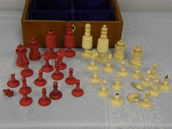 Appraisal: th century stained ivory chess set in mahogany box with