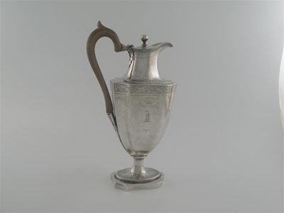 Appraisal: A George III vase-shaped hot water jug with friezes of