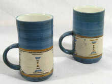 Appraisal: Troika A pair of Troika mugs painted Troika mark and