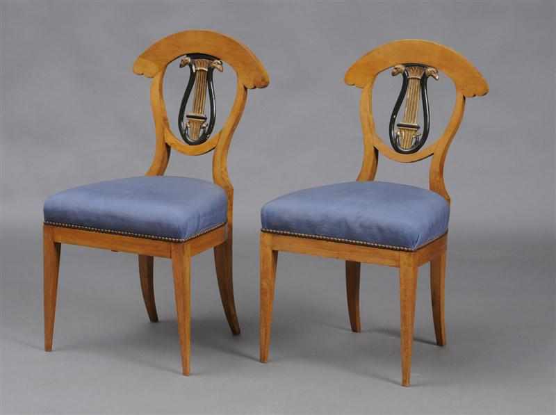 Appraisal: PAIR OF BIEDERMEIER FRUITWOOD EBONIZED AND PARCEL GILT SIDE CHAIRS