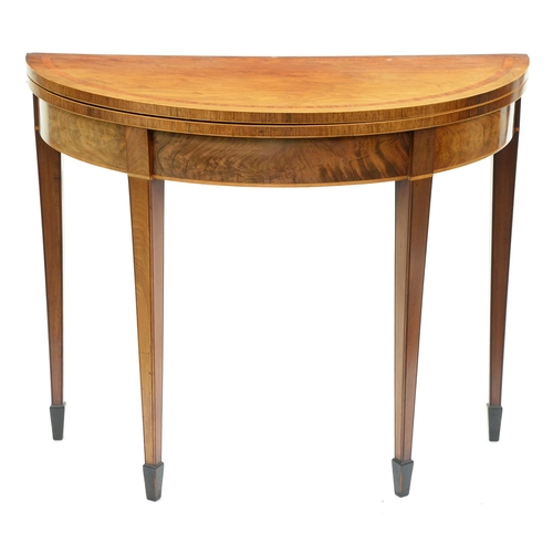 Appraisal: A George III mahogany tea table crossbanded in satinwood and