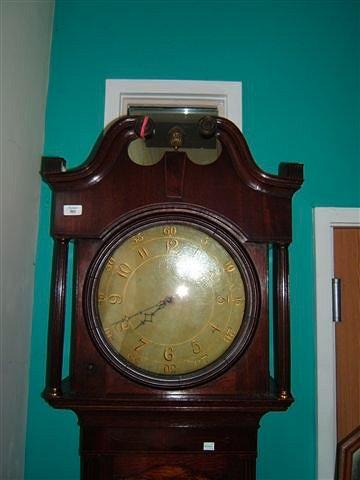 Appraisal: A Victorian oak hour long case clock the hood with