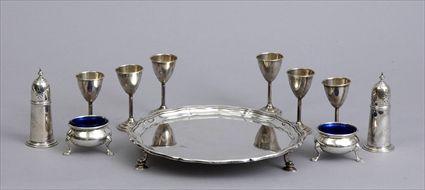 Appraisal: ENGLISH SILVER SALVER A PAIR OF AMERICAN SALTS AND PEPPERS