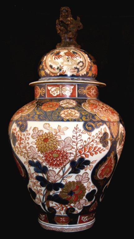 Appraisal: Large Imari baluster vase and cover decorated with reserves of