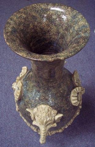 Appraisal: A Continental vase of mottled brown green and cream glaze