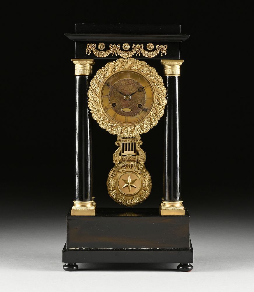 Appraisal: A LOUIS PHILIPPE GILT BRONZE MOUNTED EBONIZED WOOD PORTICO CLOCK