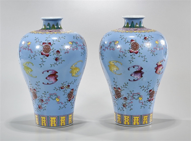 Appraisal: Pair of Chinese famille rose porcelain vases blue ground bats