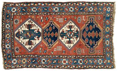 Appraisal: Kazak rug four central medallions with blue and ivory fields