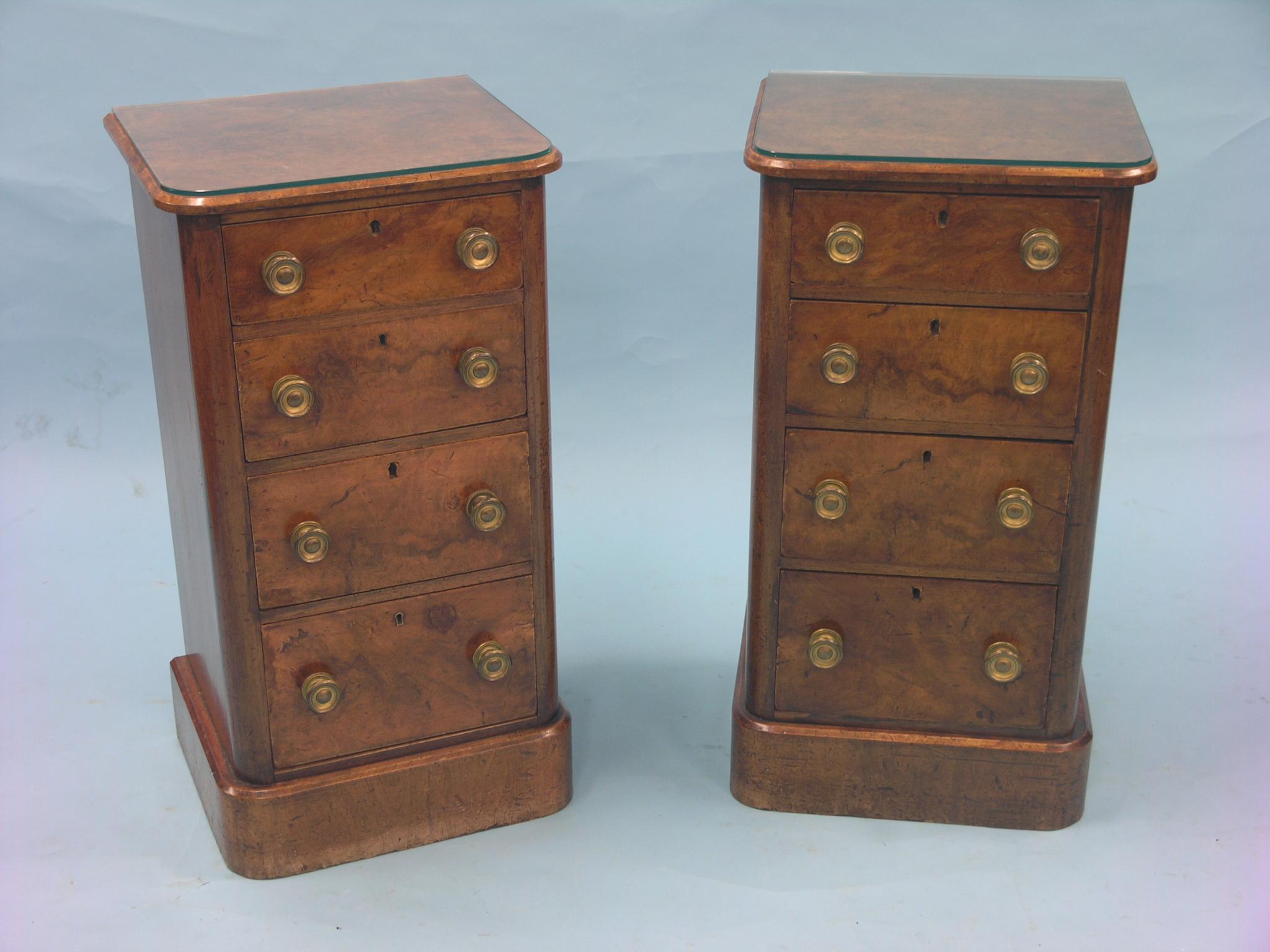 Appraisal: A pair of Victorian burr walnut chests each with four