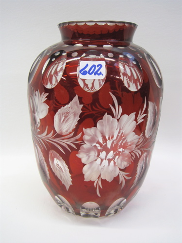 Appraisal: A BOHEMIAN HAND CUT AND ENGRAVED VASE The bulbous red