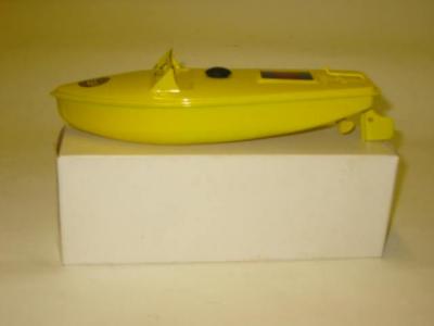 Appraisal: A Comet speedboat clockwork all yellow long first made this