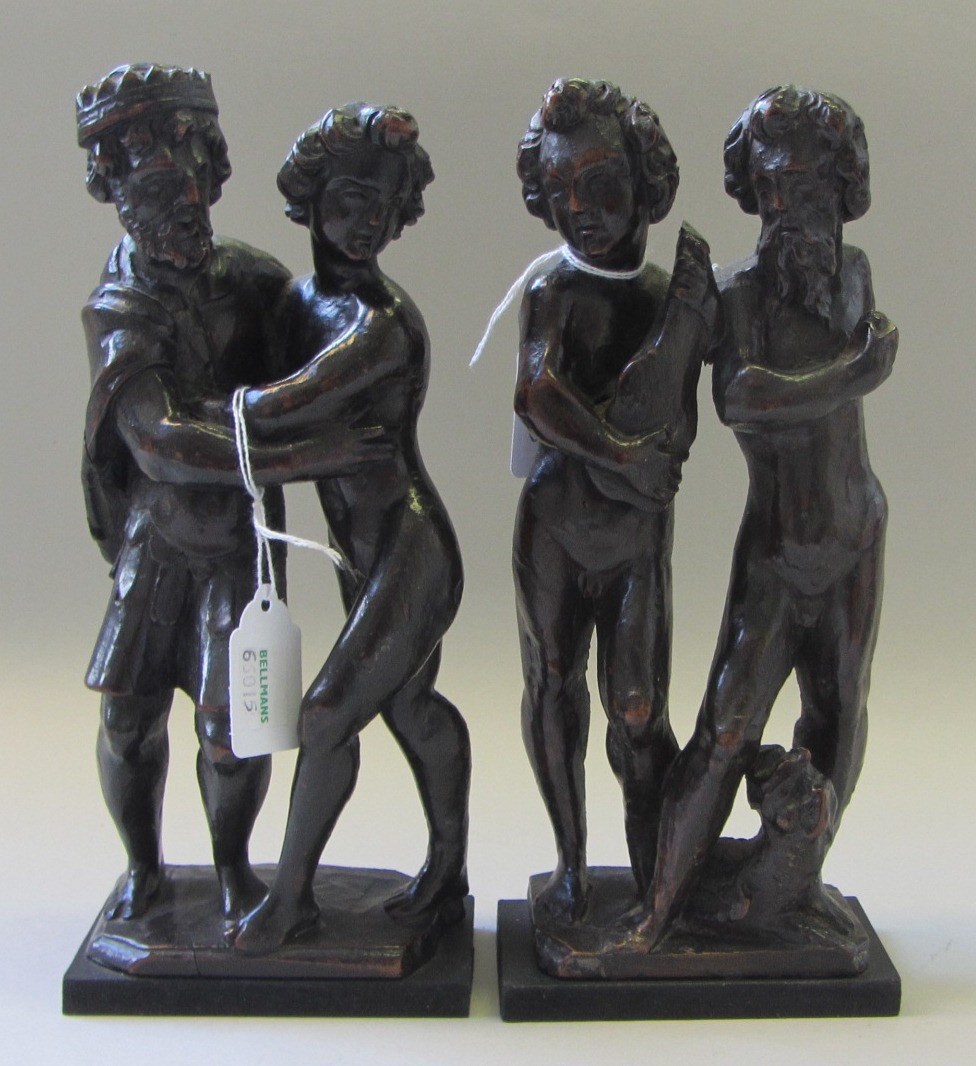 Appraisal: A pair of ebonised walnut groups of classical figures Flemish